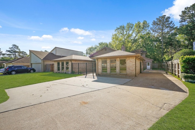13510 Cedar Point Dr, Cypress, TX 77429 - view of front of home featuring a gate, driveway, fence, brick siding, and a front yard
