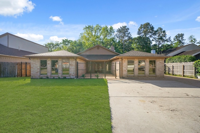 13510 Cedar Point Dr, Cypress, TX 77429 - ranch-style house featuring brick siding, fence private yard, and a front lawn