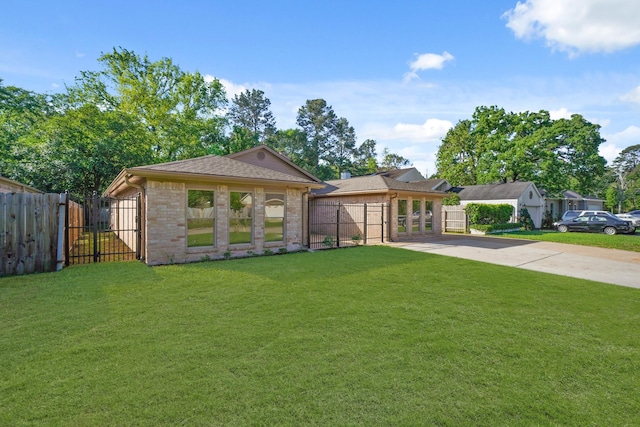 13510 Cedar Point Dr, Cypress, TX 77429 - view of front of property featuring brick siding, driveway, a front lawn, and fence