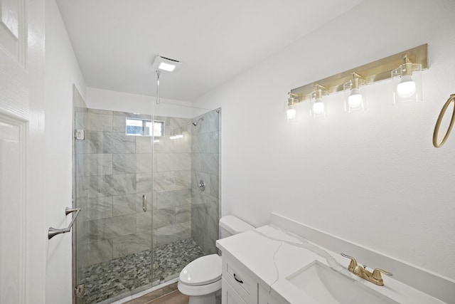 13510 Cedar Point Dr, Cypress, TX 77429 - bathroom featuring a shower stall, toilet, vanity, and wood finished floors