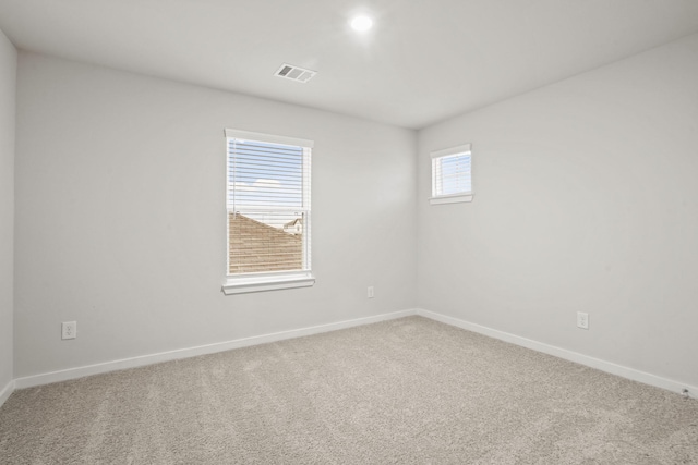 14212 Spring Valley Dr, Conroe, TX 77303 - spare room with baseboards and carpet floors