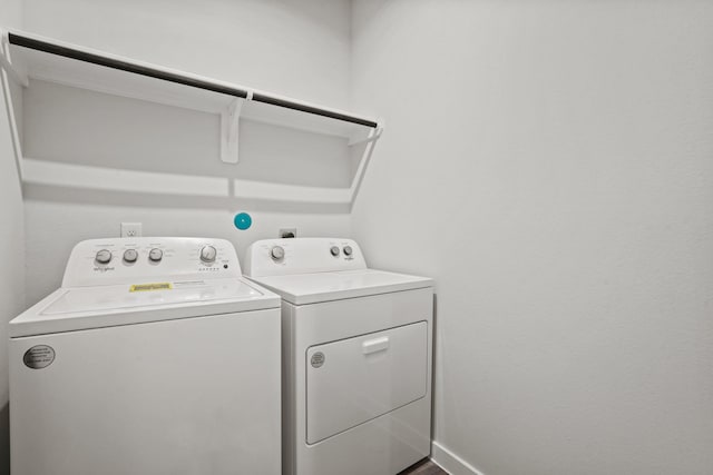 14212 Spring Valley Dr, Conroe, TX 77303 - laundry room with washing machine and dryer