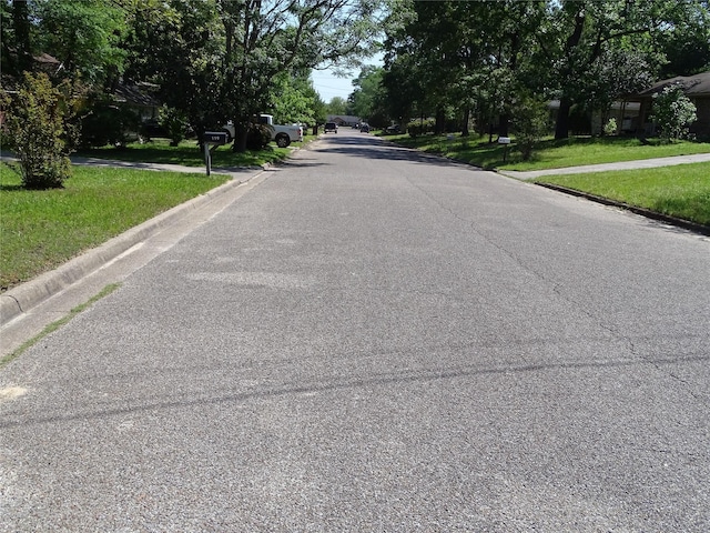117 N Forest Dr, Willis, TX 77378 - view of street featuring curbs