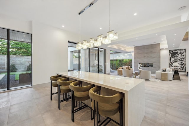 310 E Cowan Dr, Houston, TX 77007 - dining area featuring recessed lighting and a fireplace