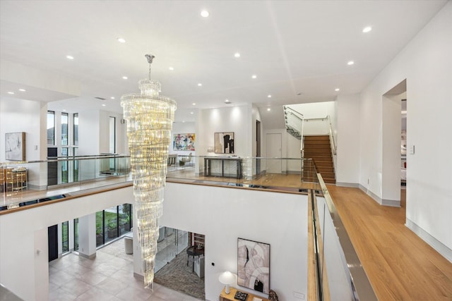 310 E Cowan Dr, Houston, TX 77007 - interior space featuring a wealth of natural light, recessed lighting, a chandelier, and wood finished floors