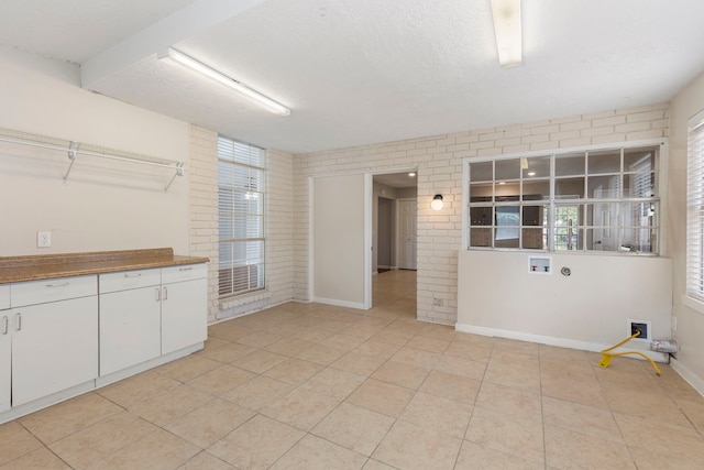 10223 Dude Rd, Houston, TX 77064 - interior space featuring a wealth of natural light, baseboards, and light tile patterned flooring