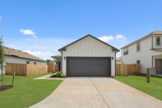 17836 Lionheart Rd, Conroe, TX 77306 - view of front of home featuring board and batten siding, concrete driveway, and an attached garage
