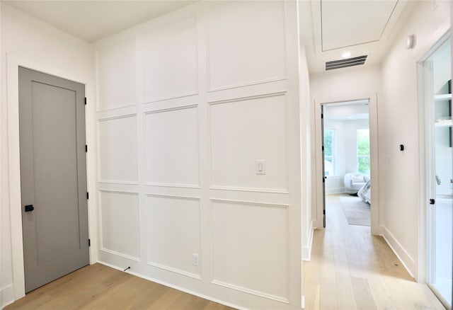 603 Neyland St, Houston, TX 77022 - corridor featuring light wood-type flooring and recessed lighting
