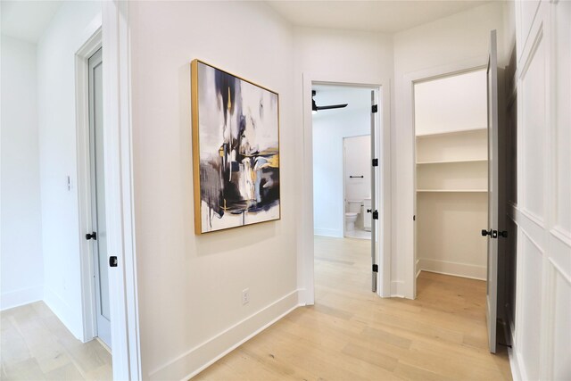 603 Neyland St, Houston, TX 77022 - corridor with light wood-type flooring and baseboards