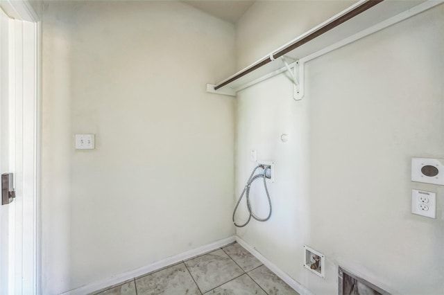 laundry room featuring baseboards, marble finish floor, laundry area, and washer hookup
