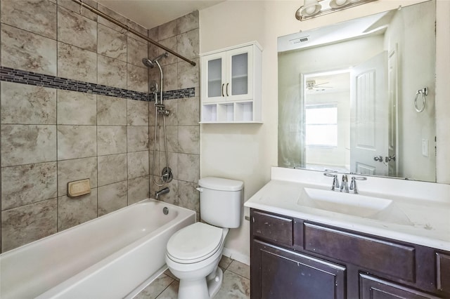 bathroom featuring visible vents, toilet,  shower combination, vanity, and tile patterned flooring