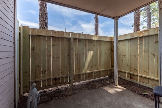 view of gate featuring fence