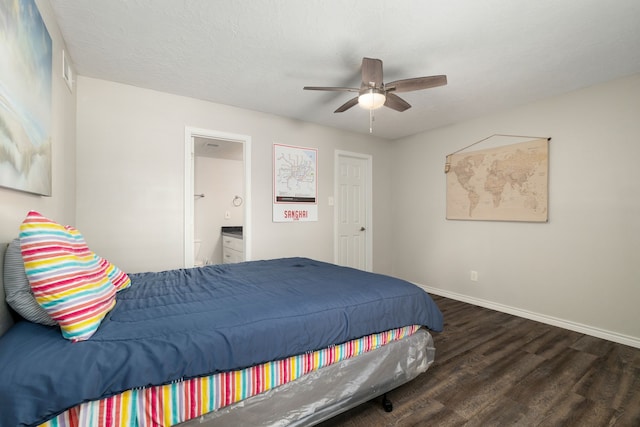 bedroom with connected bathroom, baseboards, a ceiling fan, and wood finished floors