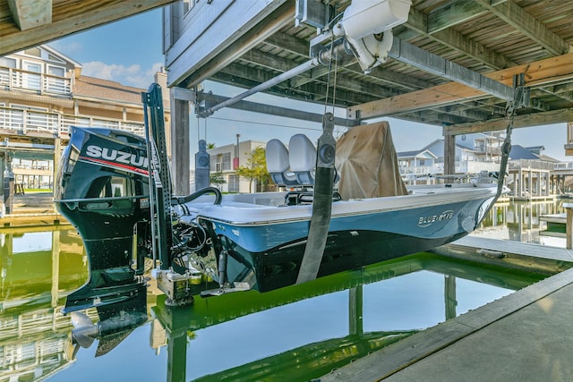 view of dock featuring boat lift