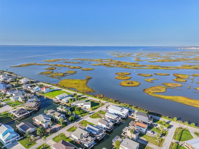 bird's eye view with a residential view and a water view