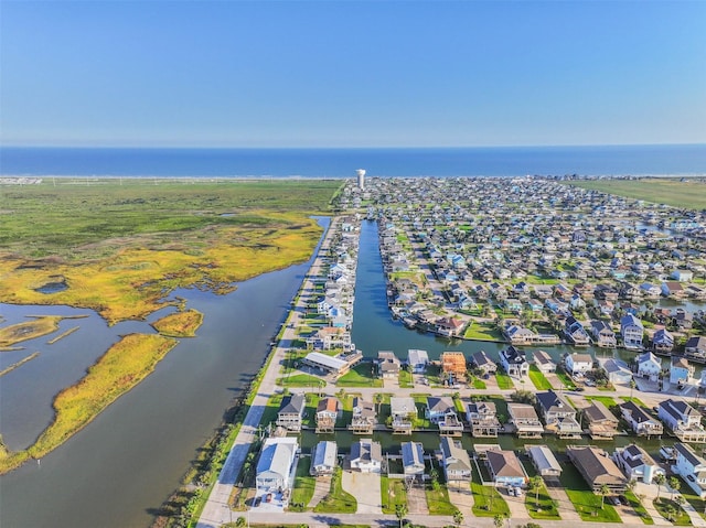 aerial view with a residential view and a water view
