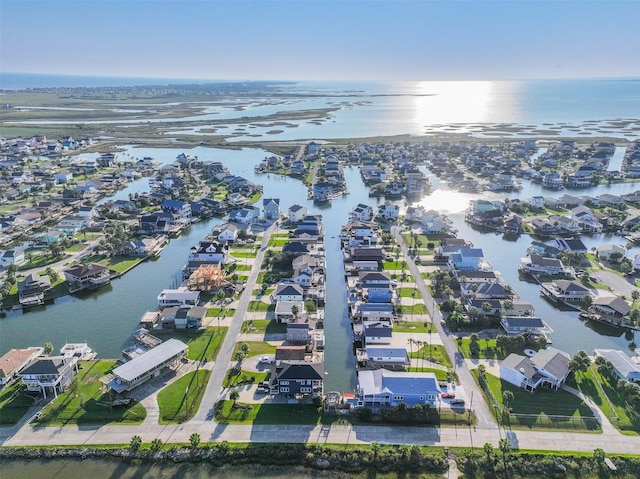 bird's eye view with a residential view and a water view