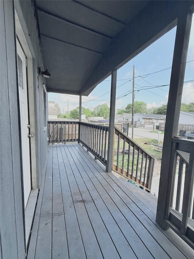 wooden deck featuring covered porch