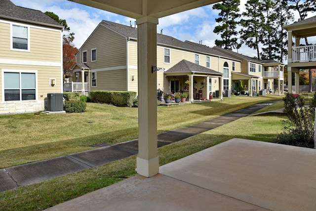 exterior space with a residential view and central AC