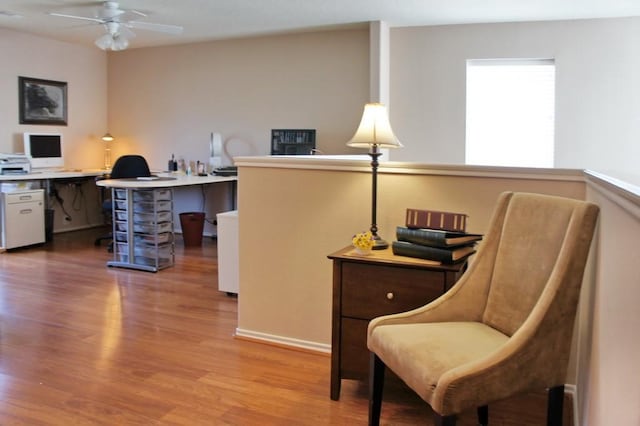 home office featuring ceiling fan and wood finished floors