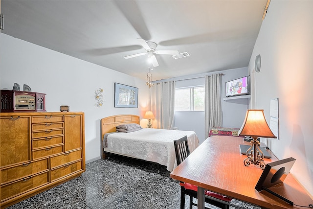 5622 Sheraton Oaks Dr, Houston, TX 77091 - bedroom with dark carpet, ceiling fan, and baseboards