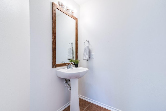 7215 Autumn Day Ct, Magnolia, TX 77354 - bathroom with tile patterned floors and baseboards