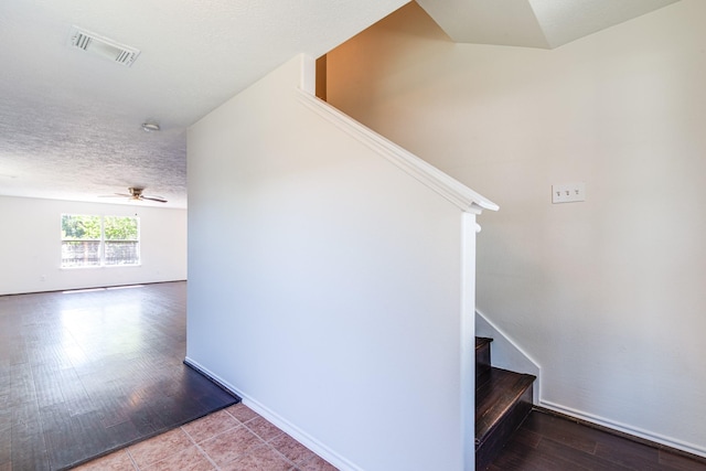 7215 Autumn Day Ct, Magnolia, TX 77354 - stairs with wood finished floors, visible vents, baseboards, and ceiling fan