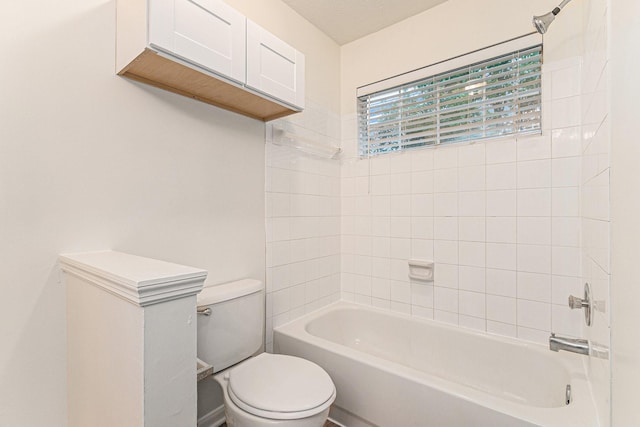 full bath featuring toilet and bathing tub / shower combination