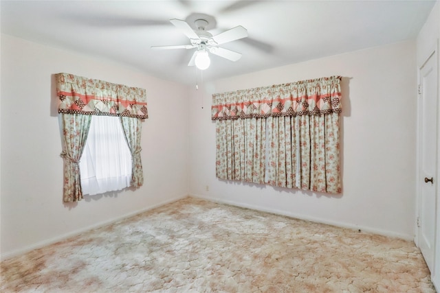 1220 San Felipe St, Angleton, TX 77515 - carpeted empty room with baseboards and a ceiling fan