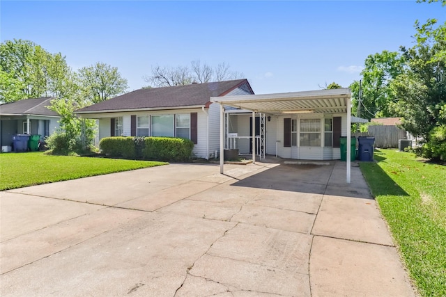 1220 San Felipe St, Angleton, TX 77515 - single story home featuring concrete driveway, fence, and a front lawn