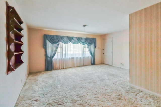 1220 San Felipe St, Angleton, TX 77515 - spare room featuring carpet