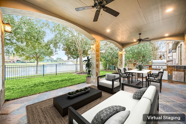 2117 Quiet Falls Ln, League City, TX 77573 - view of patio with a water view, outdoor lounge area, grilling area, outdoor dining area, and an outdoor kitchen