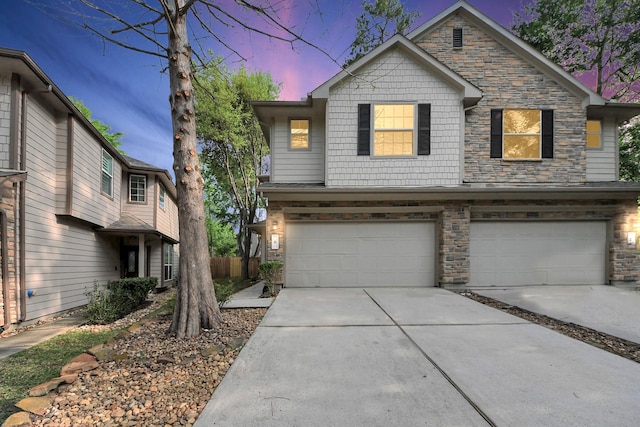 6 Whitekirk Pl, Magnolia, TX 77354 - view of property featuring fence, stone siding, a garage, and driveway