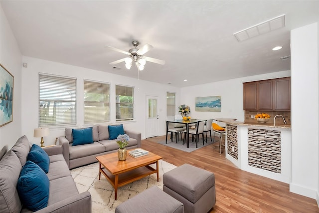 6 Whitekirk Pl, Magnolia, TX 77354 - living room with recessed lighting, visible vents, light wood-type flooring, and a ceiling fan