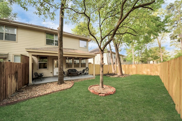 6 Whitekirk Pl, Magnolia, TX 77354 - rear view of house featuring a patio area, a fenced backyard, and a yard