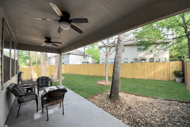 6 Whitekirk Pl, Magnolia, TX 77354 - view of patio with a fenced backyard and a ceiling fan