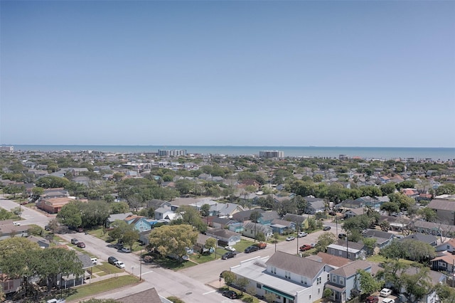 bird's eye view featuring a water view and a residential view