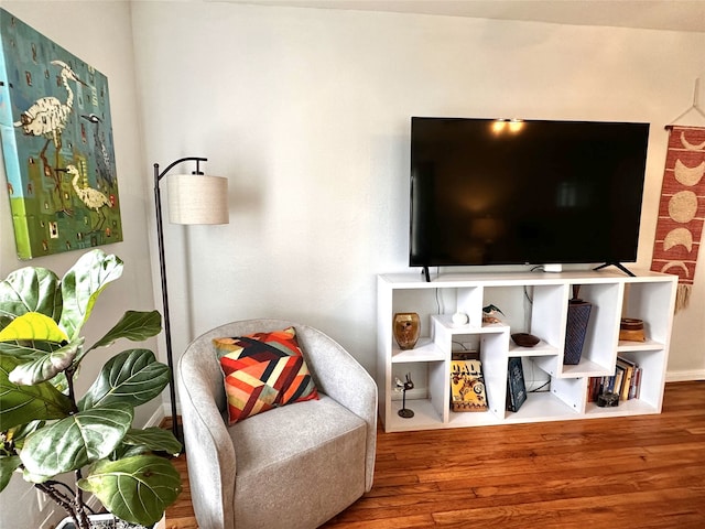 living area with wood finished floors