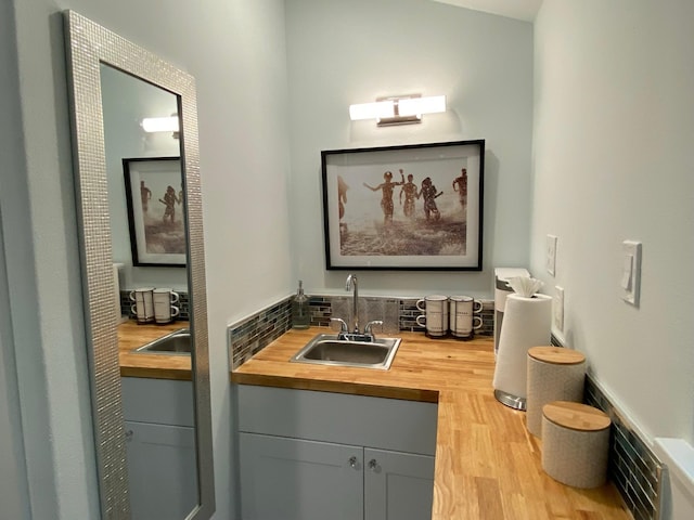 bathroom featuring wood finished floors and vanity