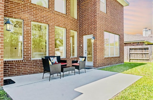 view of patio / terrace with fence