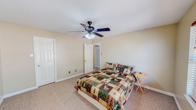 bedroom with baseboards, a ceiling fan, and carpet floors