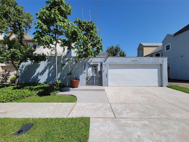 view of front of house featuring driveway and a garage