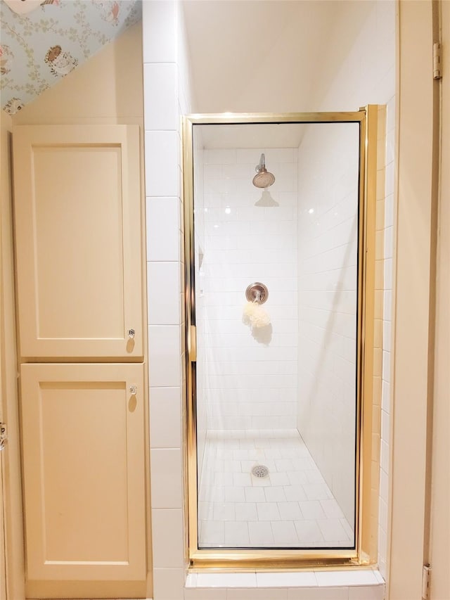 full bathroom with a shower stall