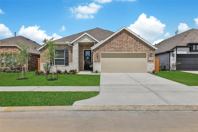 15415 Surrey Pines Ln, Houston, TX 77044 - view of front of property featuring brick siding, a garage, a front yard, and concrete driveway