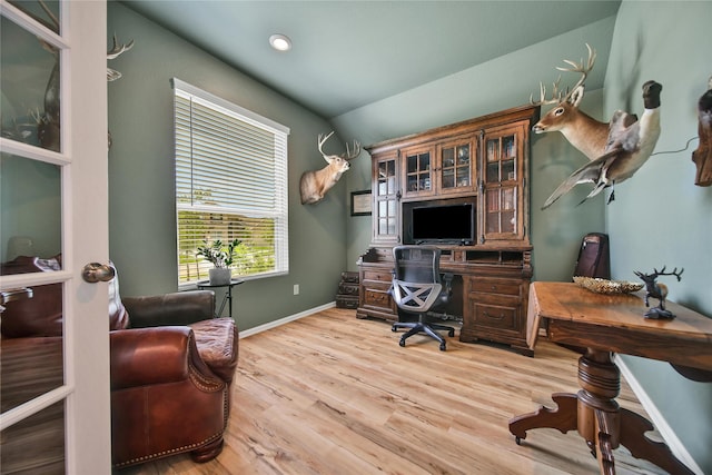 15415 Surrey Pines Ln, Houston, TX 77044 - office space featuring lofted ceiling, light wood-style flooring, and baseboards