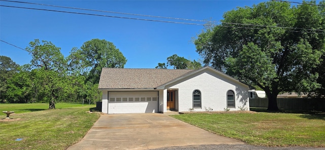 520 Walnut St, Waller, TX 77484 - single story home featuring brick siding, an attached garage, driveway, and a front lawn