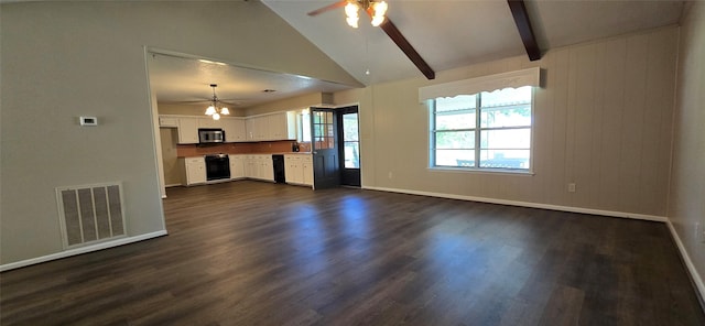 520 Walnut St, Waller, TX 77484 - unfurnished living room featuring dark wood-style flooring, visible vents, ceiling fan, and vaulted ceiling with beams