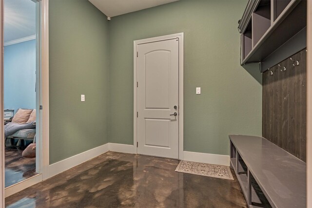 12122 Hawthorne Dr, Montgomery, TX 77356 - mudroom with baseboards and concrete flooring