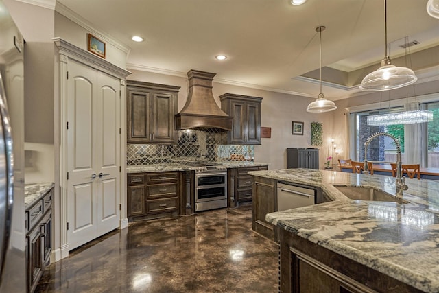 12122 Hawthorne Dr, Montgomery, TX 77356 - kitchen with premium range hood, appliances with stainless steel finishes, crown molding, dark brown cabinetry, and tasteful backsplash