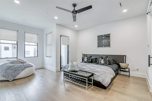 bedroom with recessed lighting, light wood-style flooring, baseboards, and ceiling fan